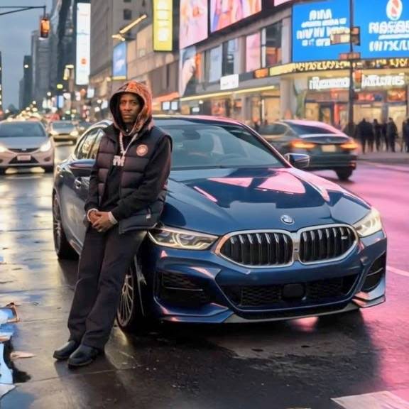 MINDBENDA leaning against a dark blue BMW on a rain-slicked city street