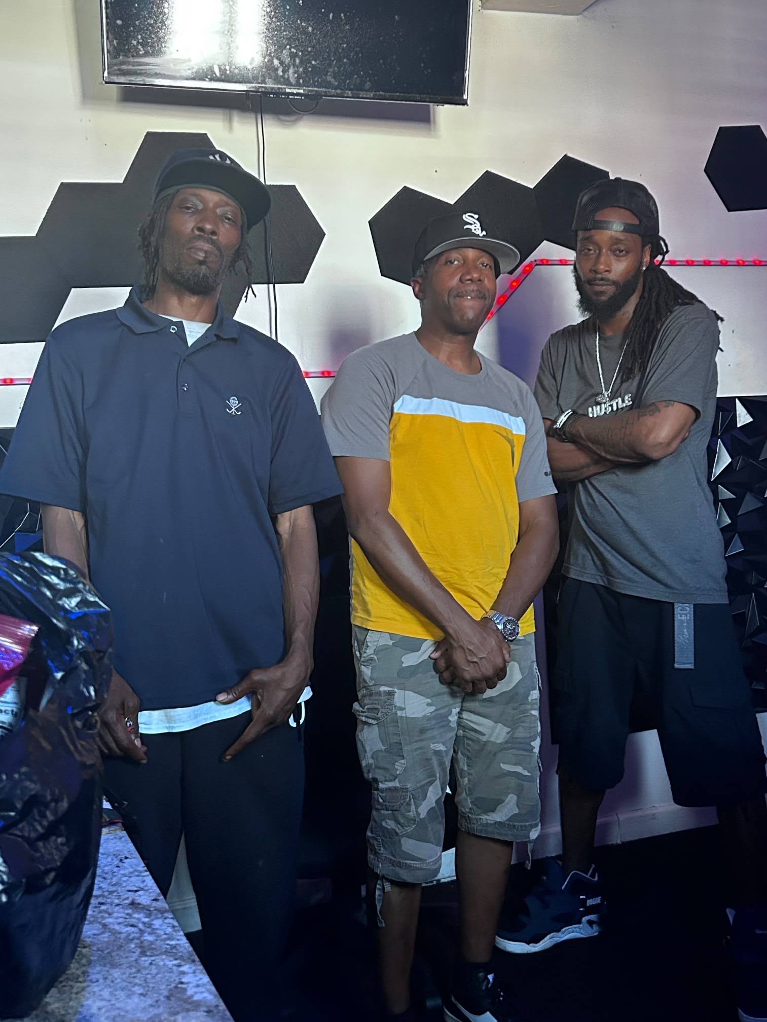 Group shot of MINDBENDA with KALEEK the GOD and KB YUNG HU$TLE
